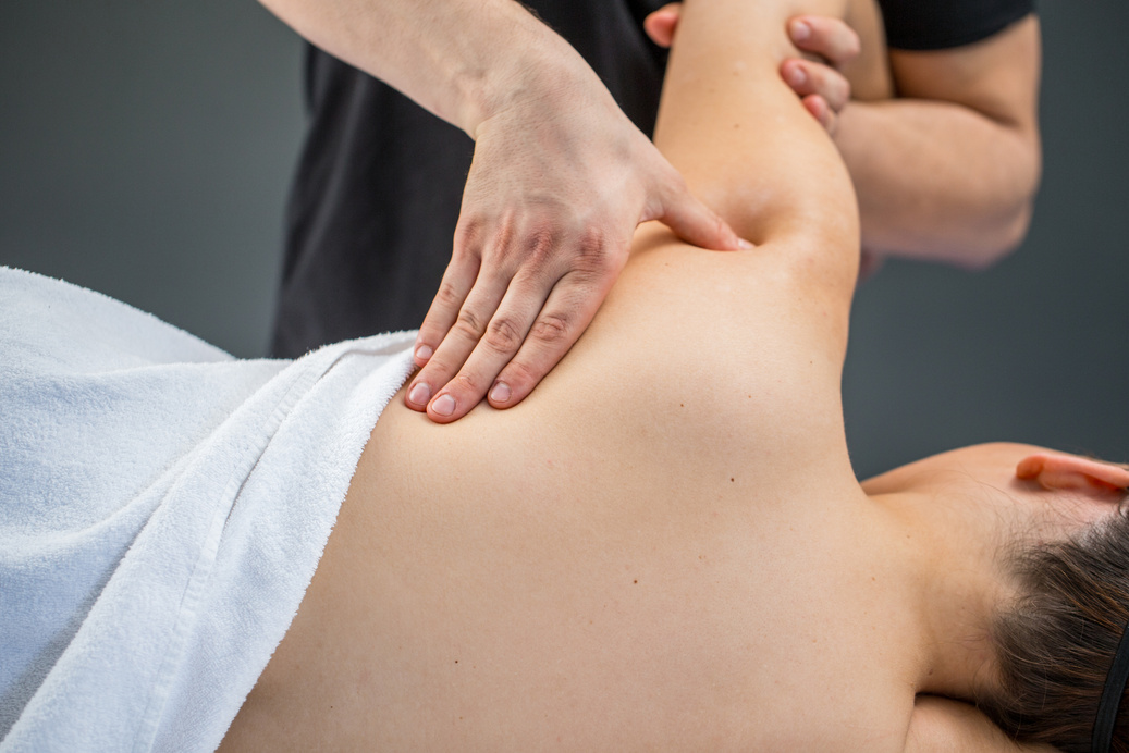 Woman Having Myofascial Release Therapy To Prevent Neck And Back Pain